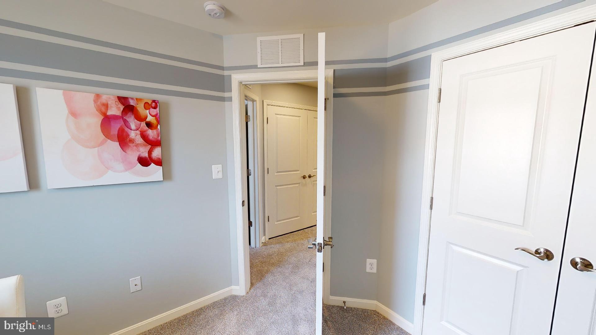 314 Purple Place Edgewood, MD 21040 - Photo 27 of 46 a view of a hallway with wooden floor and closet