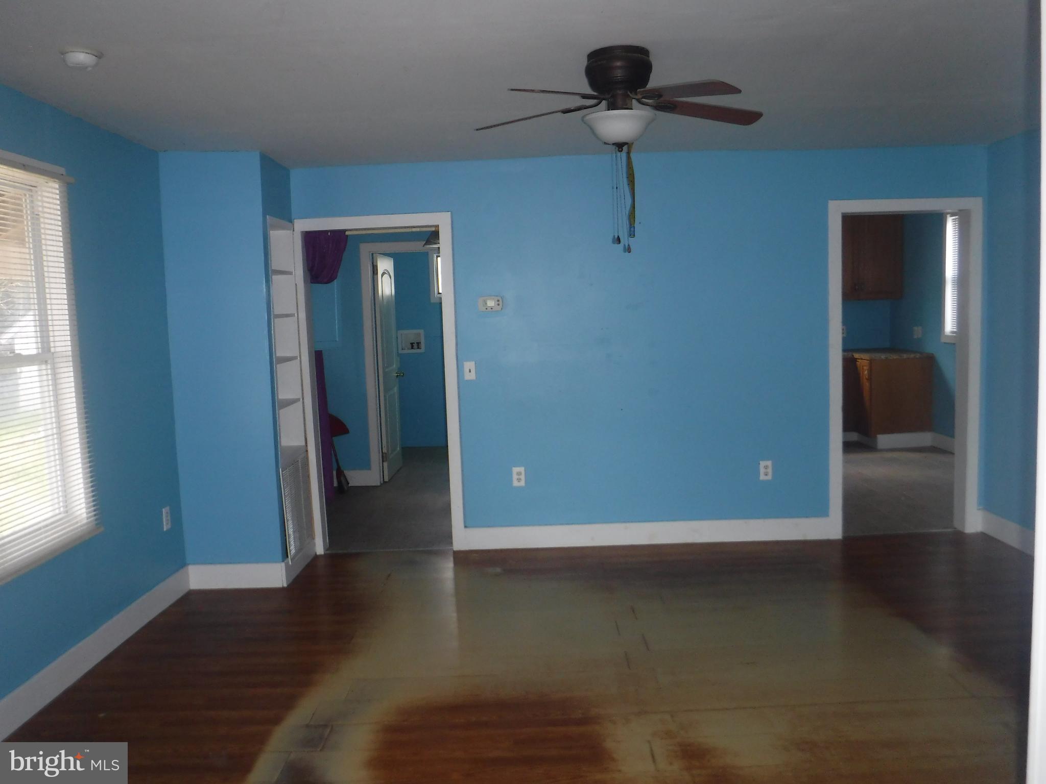 3 Mill Street Harrington, DE 19952 - Photo 4 of 25 a view of a room with wooden floor and carpet