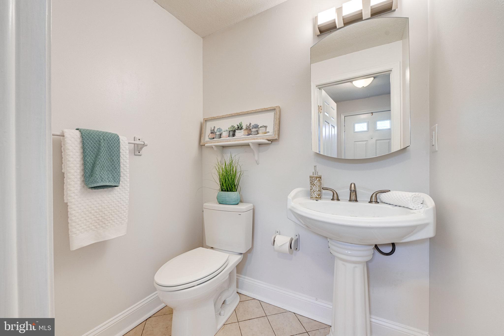 5832 Canvasback Road Burke, VA 22015 - Photo 8 of 59 Updated Powder Bath on Main Level