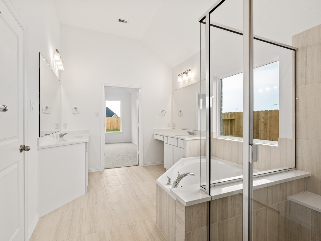 306 Strm Bnd Way Rosenberg, TX 77471 - Photo 22 of 35 a bathroom with a sink and a mirror