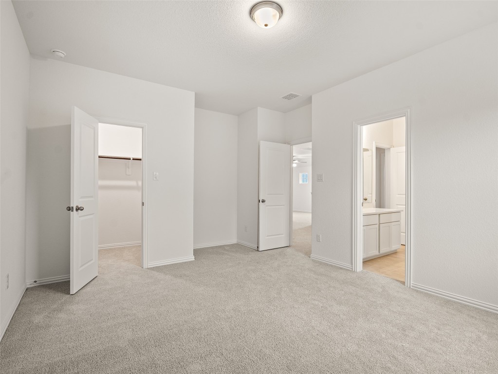 306 Strm Bnd Way Rosenberg, TX 77471 - Photo 31 of 35 an empty room with closet area