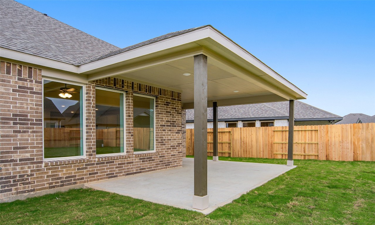 306 Strm Bnd Way Rosenberg, TX 77471 - Photo 32 of 35 a front view of a house with a yard