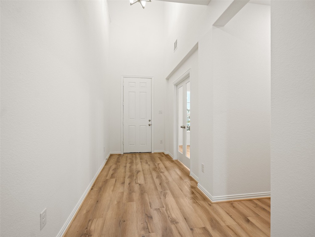 306 Strm Bnd Way Rosenberg, TX 77471 - Photo 5 of 35 a view of a room with wooden floor