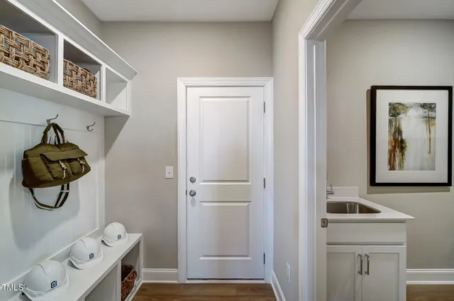 a bathroom with a shower and mirror