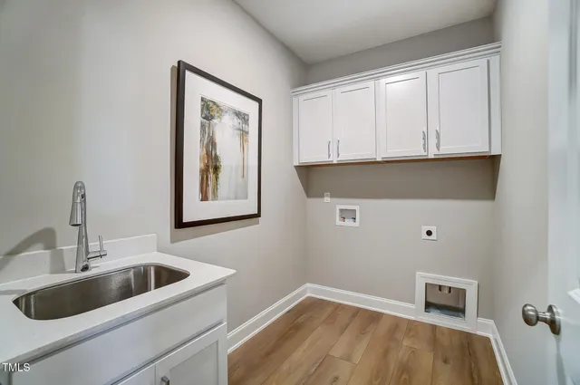 a bedroom with bed and window