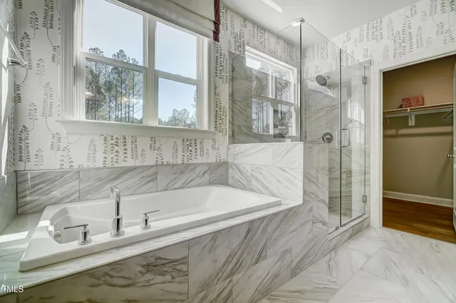 a view of entryway with wooden floor and stairs