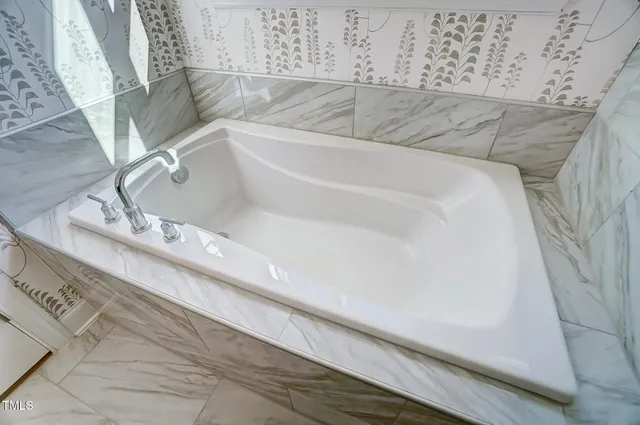 a view of a swimming pool with a yard and mountain view