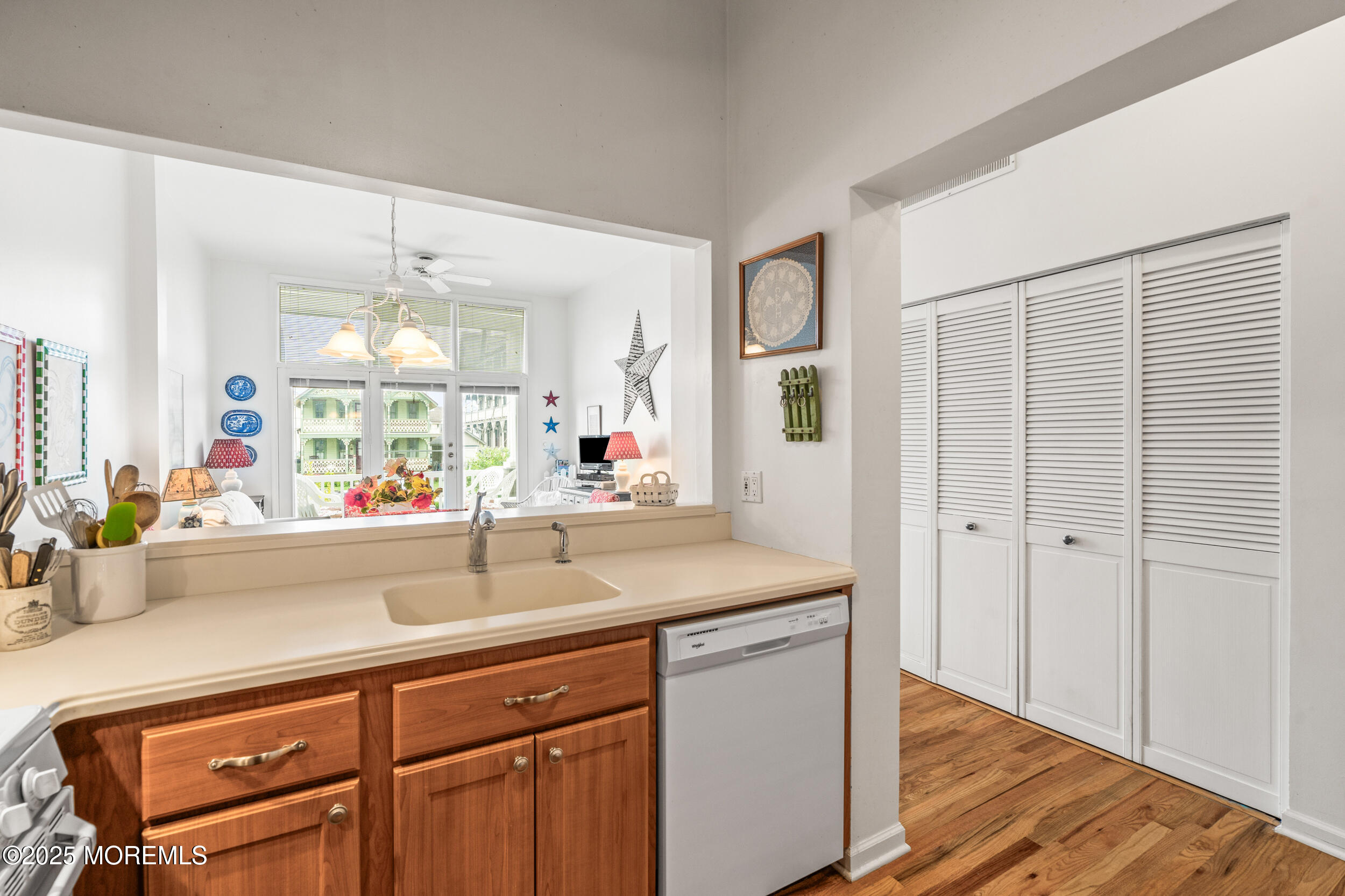 4 Ocean Avenue, Unit 5 Ocean Grove, NJ 07756 - Photo 13 of 81 a kitchen with a sink cabinets and wooden floor