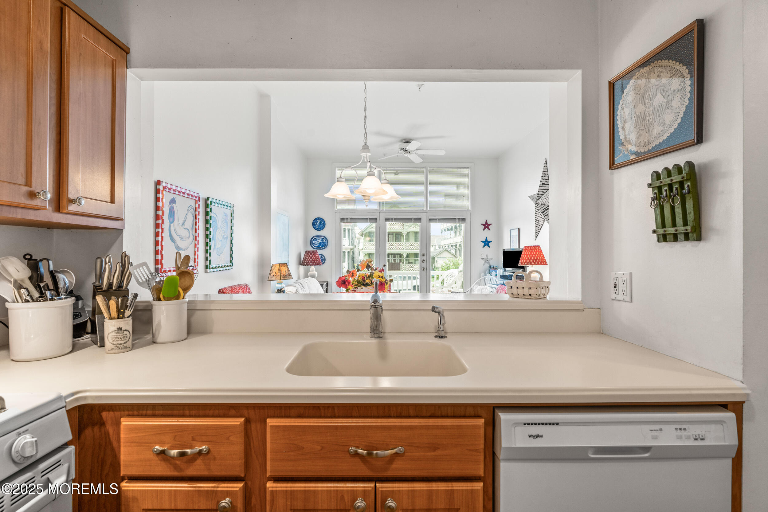 4 Ocean Avenue, Unit 5 Ocean Grove, NJ 07756 - Photo 15 of 81 a kitchen with a sink and a refrigerator