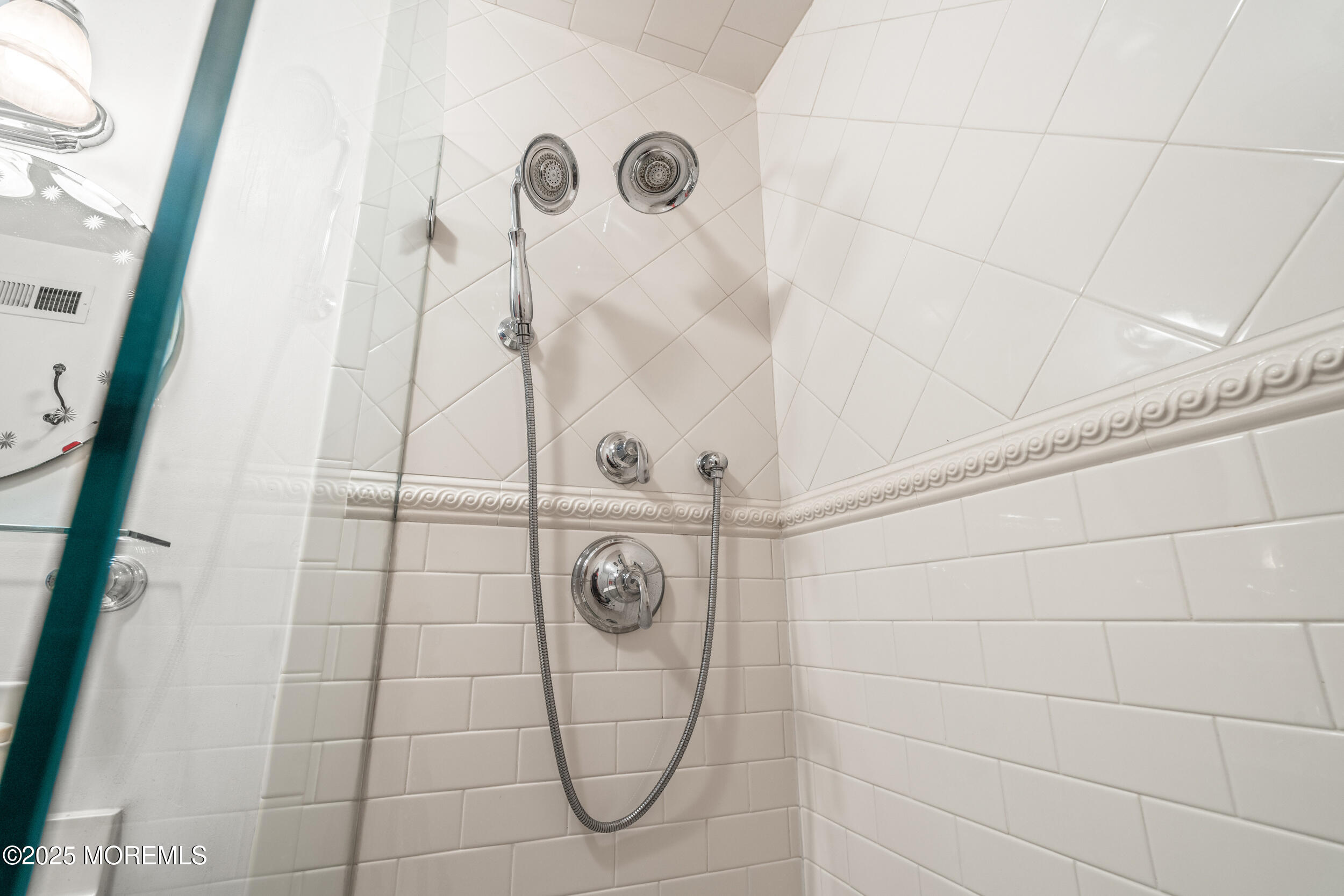 4 Ocean Avenue, Unit 5 Ocean Grove, NJ 07756 - Photo 33 of 81 a bathroom with a shower