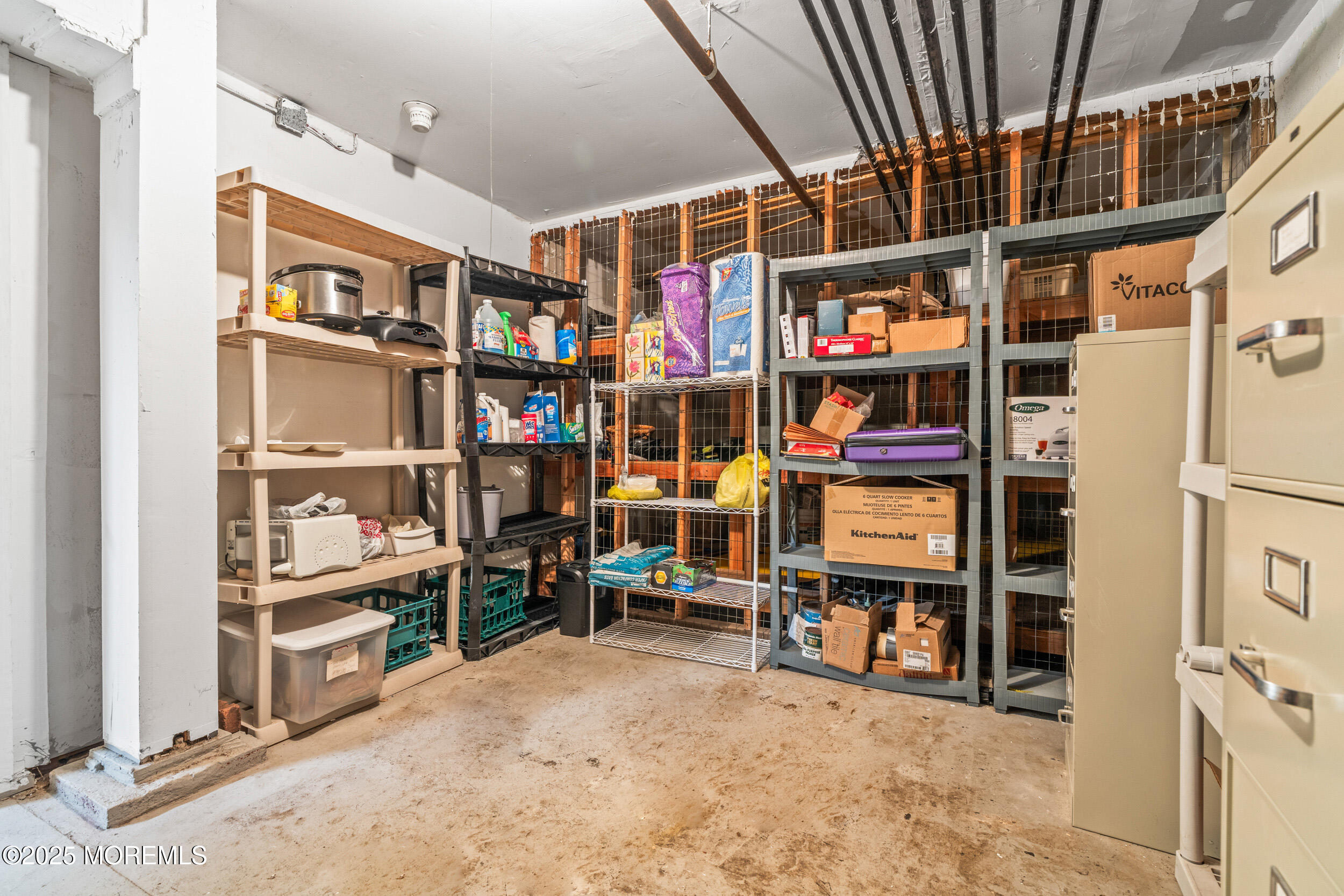 4 Ocean Avenue, Unit 5 Ocean Grove, NJ 07756 - Photo 40 of 81 a view of store room with racks
