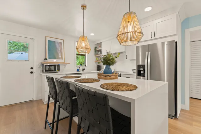a very nice looking dining room with a table and chairs