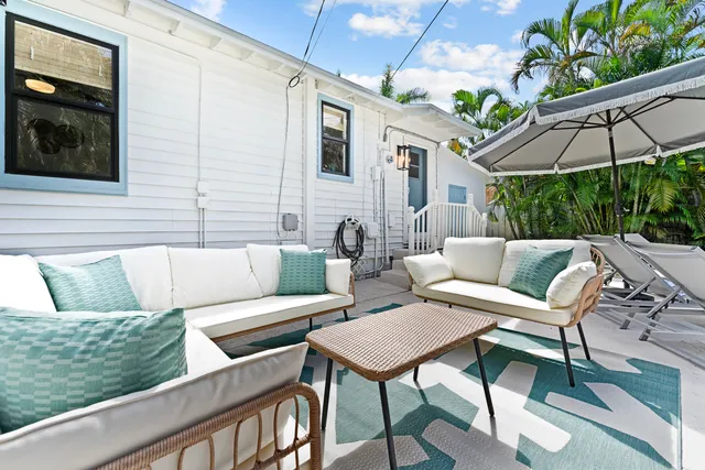 a outdoor living space with furniture and garden
