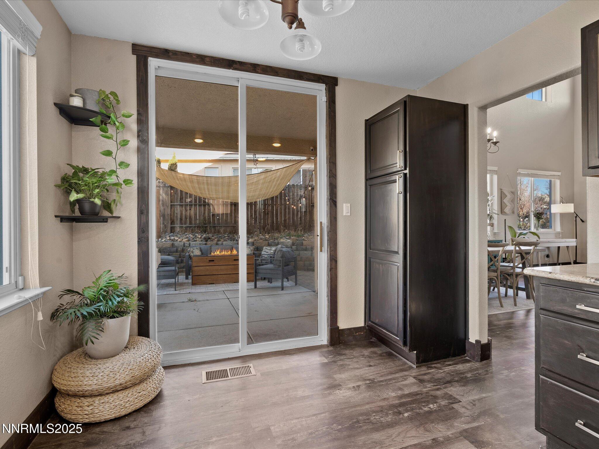 7227 Heatherwood Drive Reno, NV 89523 - Photo 20 of 55 a room with furniture and a potted plant