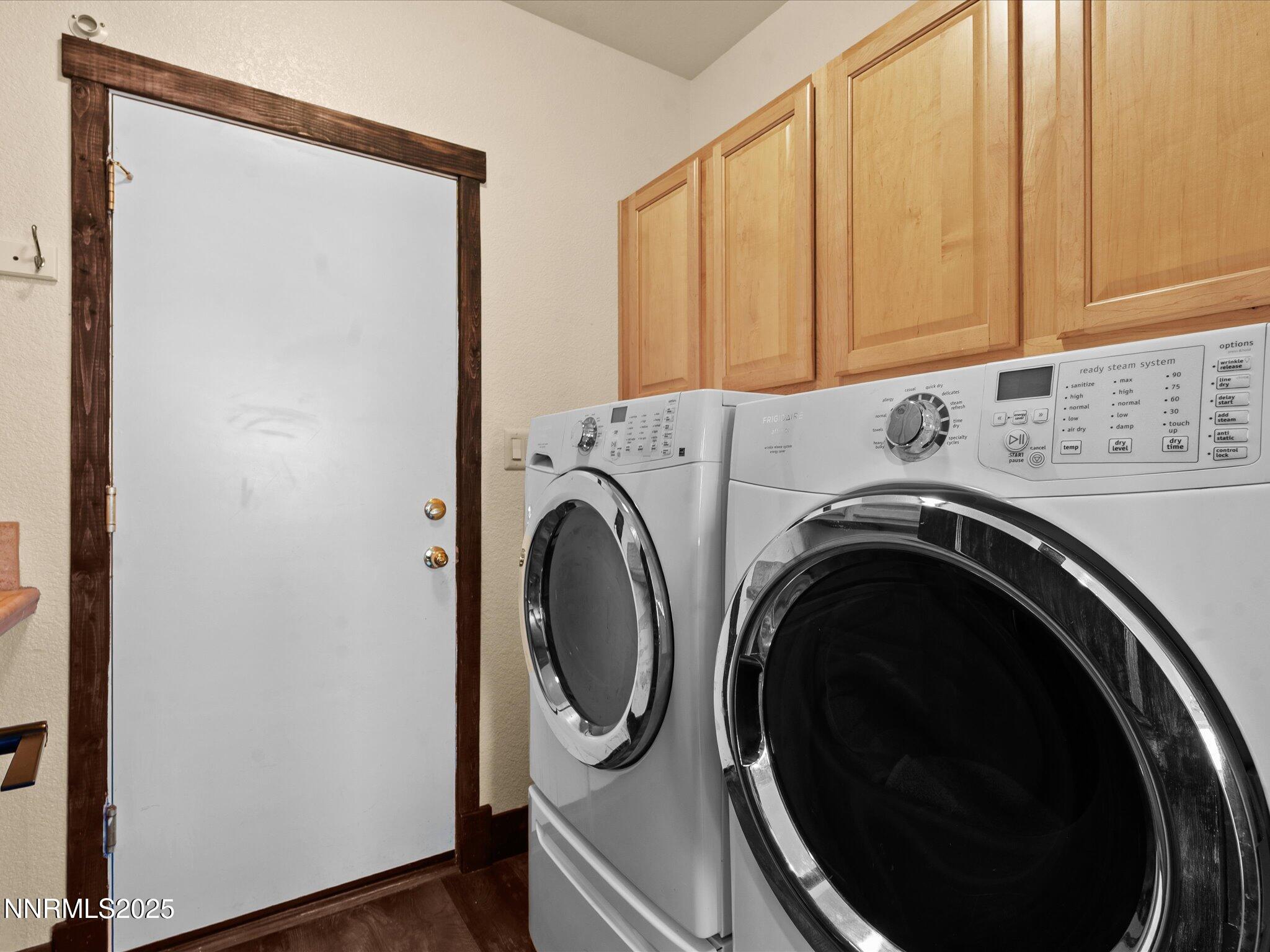 7227 Heatherwood Drive Reno, NV 89523 - Photo 30 of 55 a utility room with dryer and washer