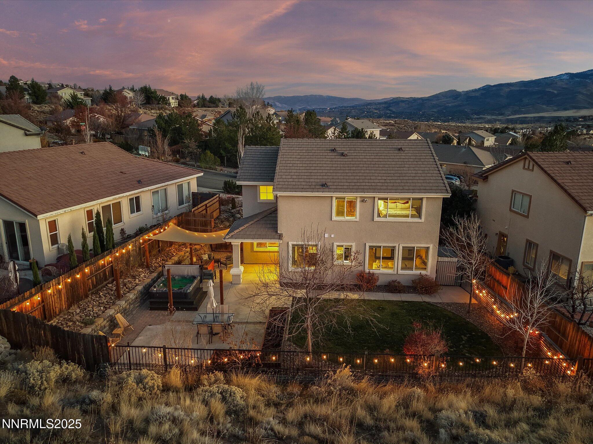 7227 Heatherwood Drive Reno, NV 89523 - Photo 3 of 55 an aerial view of a house with a ocean view