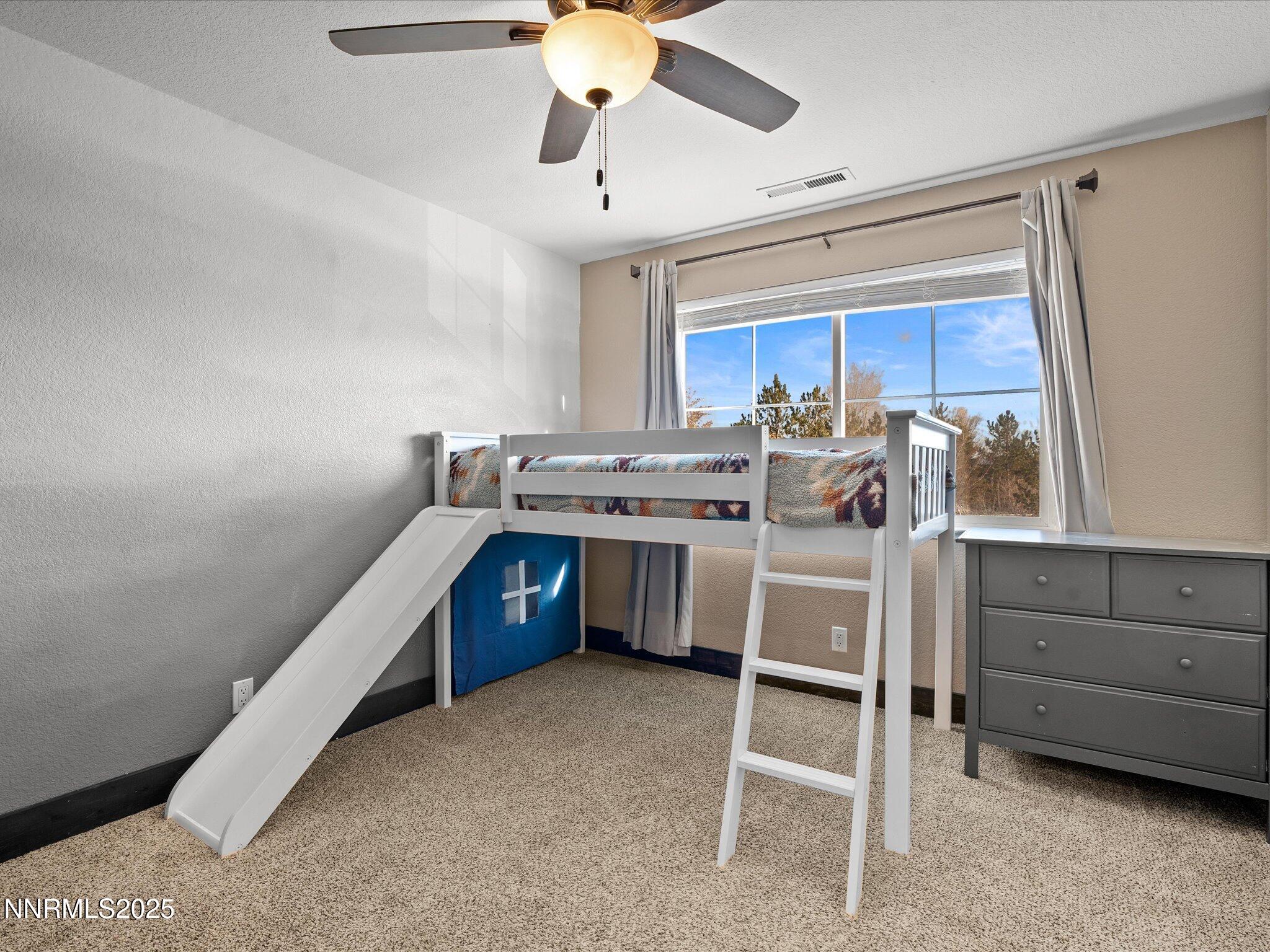 7227 Heatherwood Drive Reno, NV 89523 - Photo 43 of 55 a kitchen with a cabinets and chairs