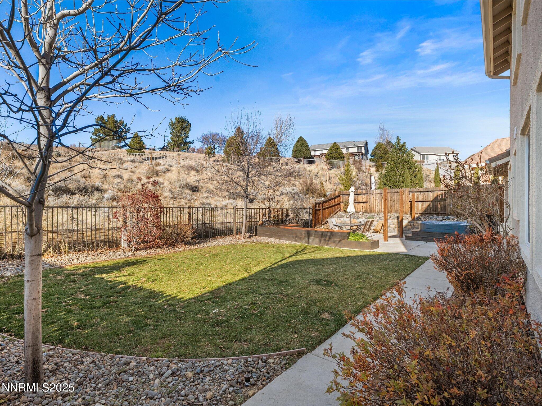 7227 Heatherwood Drive Reno, NV 89523 - Photo 47 of 55 a view of a large yard with large trees