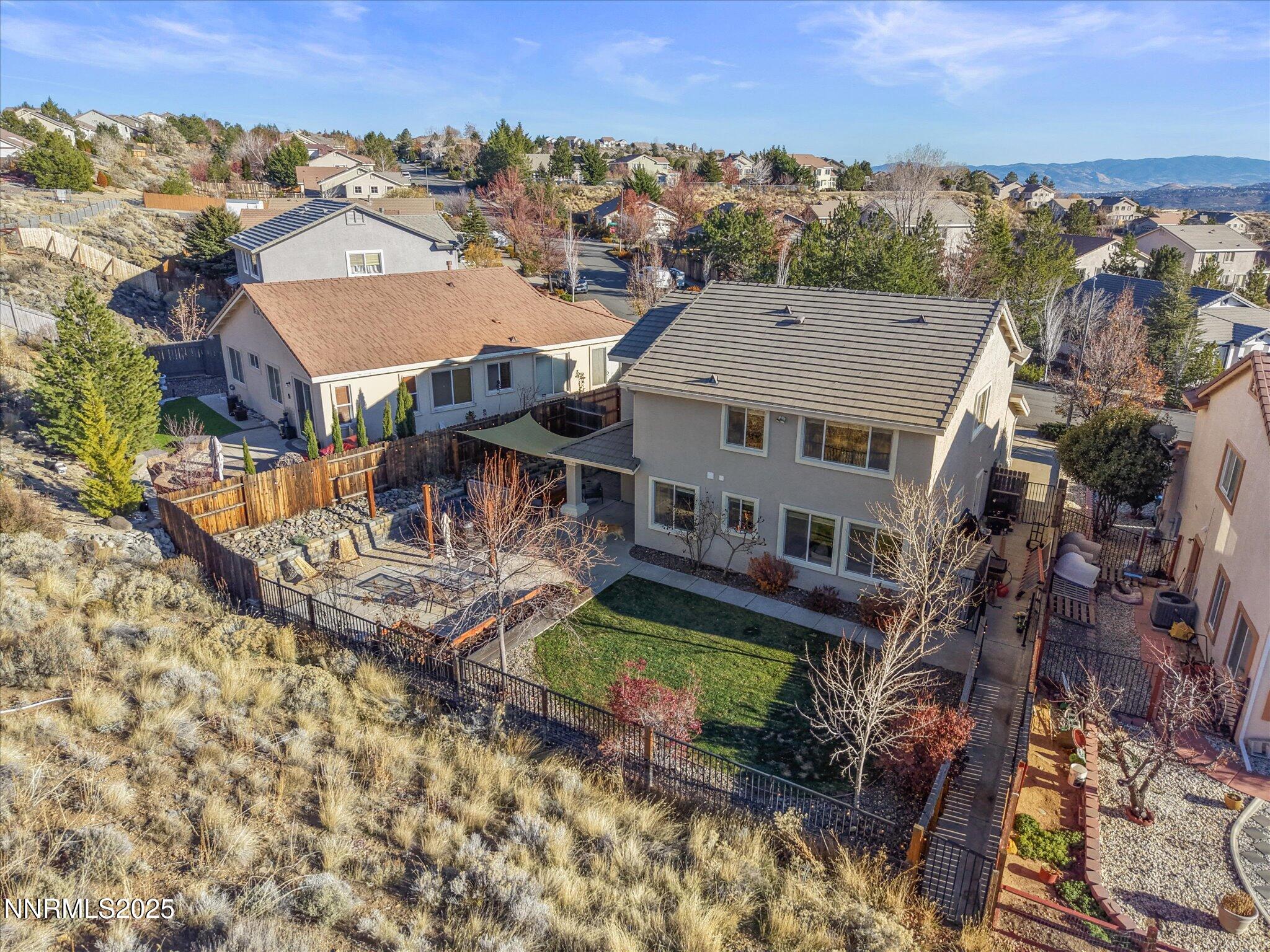 7227 Heatherwood Drive Reno, NV 89523 - Photo 50 of 55 an aerial view of a house with a ocean view