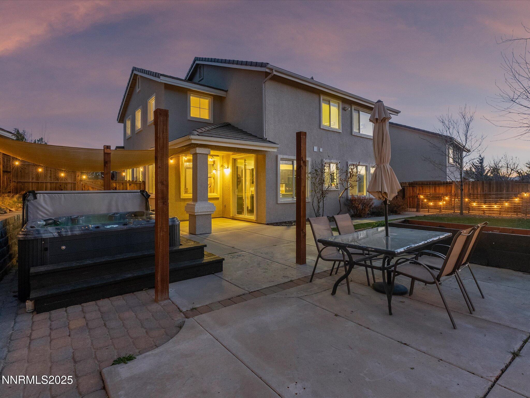 7227 Heatherwood Drive Reno, NV 89523 - Photo 5 of 55 a view of a dinning table and chairs in the patio