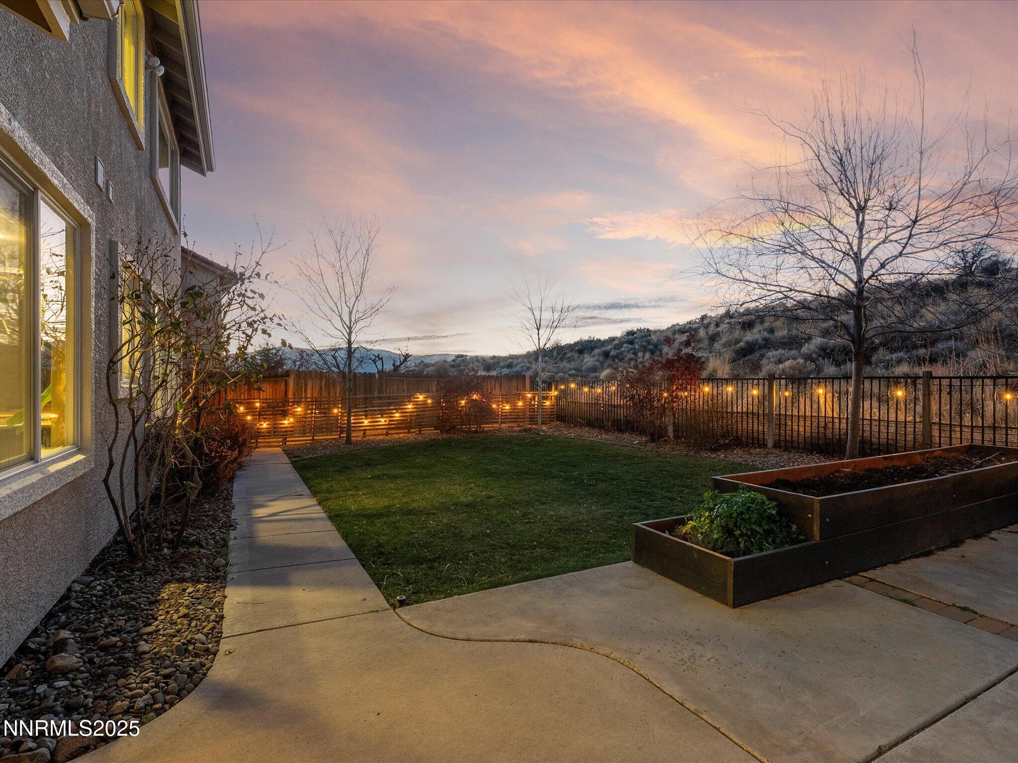 7227 Heatherwood Drive Reno, NV 89523 - Photo 9 of 55 a view of a garden with sitting area