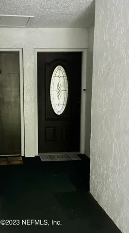 a view of a door of a house