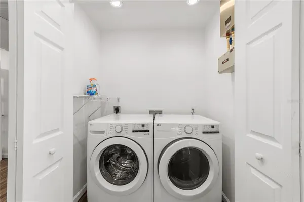 a utility room with dryer and washer