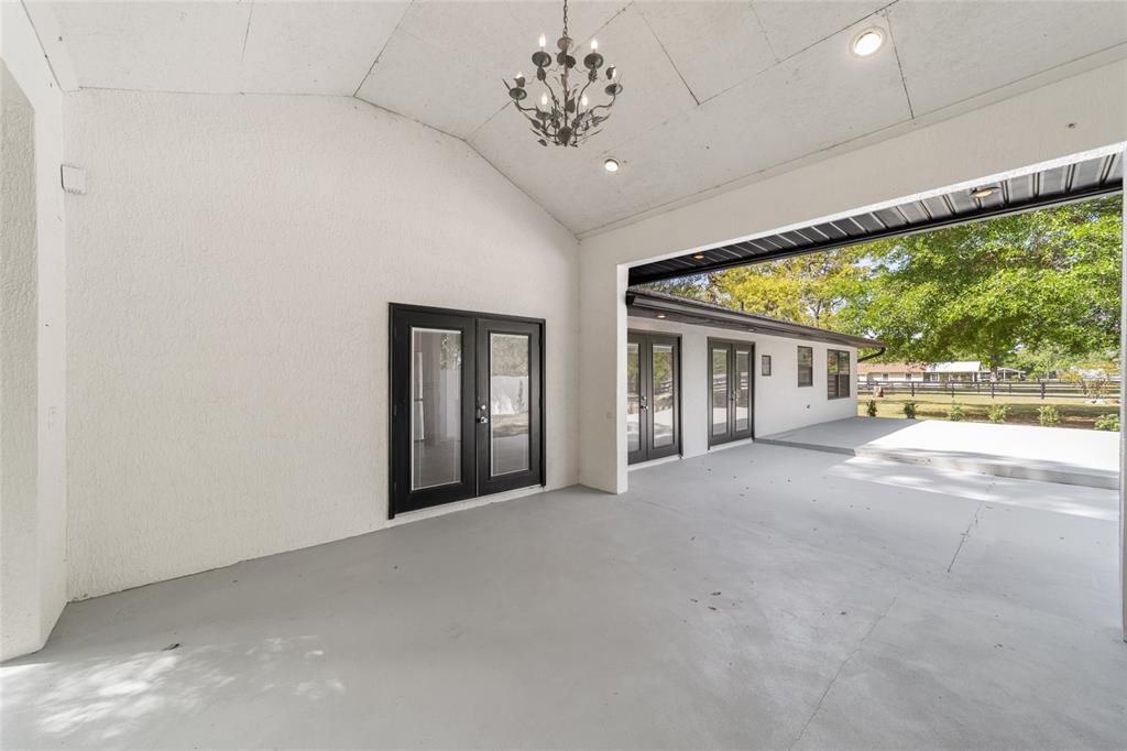 5721 Southwest 31st Street Ocala, FL 34474 - Photo 30 of 41 a view of a big room with large windows