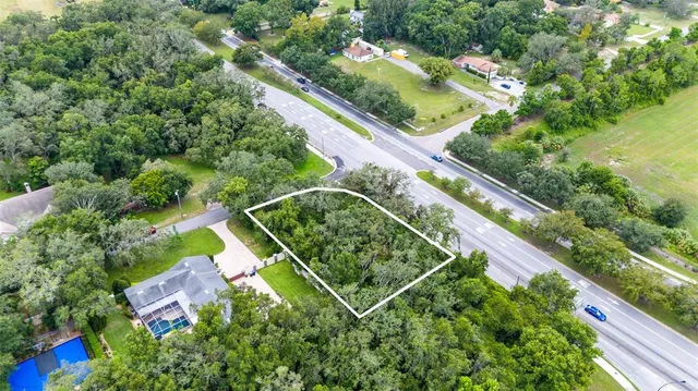 an aerial view of residential houses and city view