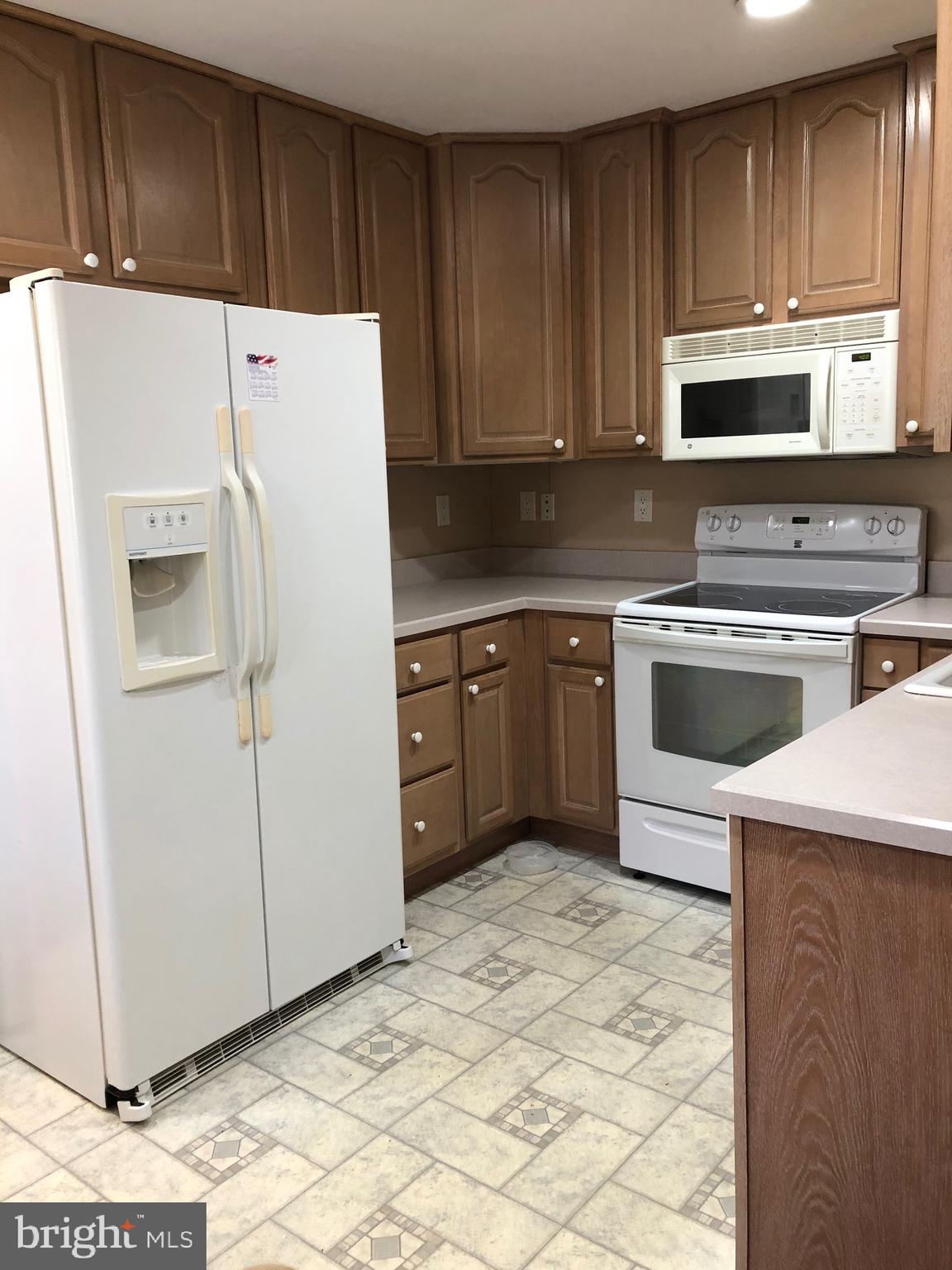 609 Arlington Road Fairless Hills, PA 19030 - Photo 25 of 45 Kitchen with newer appliances and cabinetry