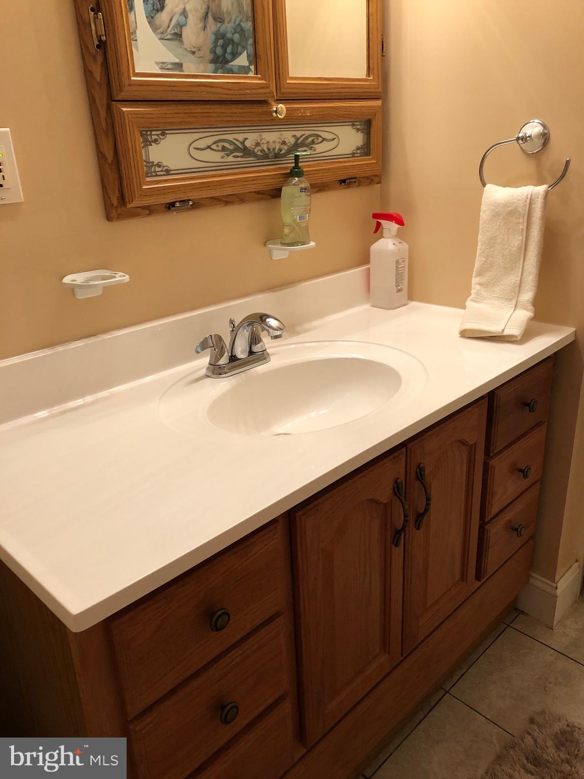 609 Arlington Road Fairless Hills, PA 19030 - Photo 35 of 45 Hallway bathroom with corian vanette
