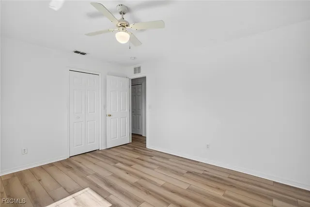 a view of a livingroom with wooden floor