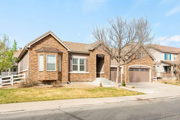 a front view of a house with a patio