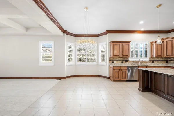 a large kitchen with a large window