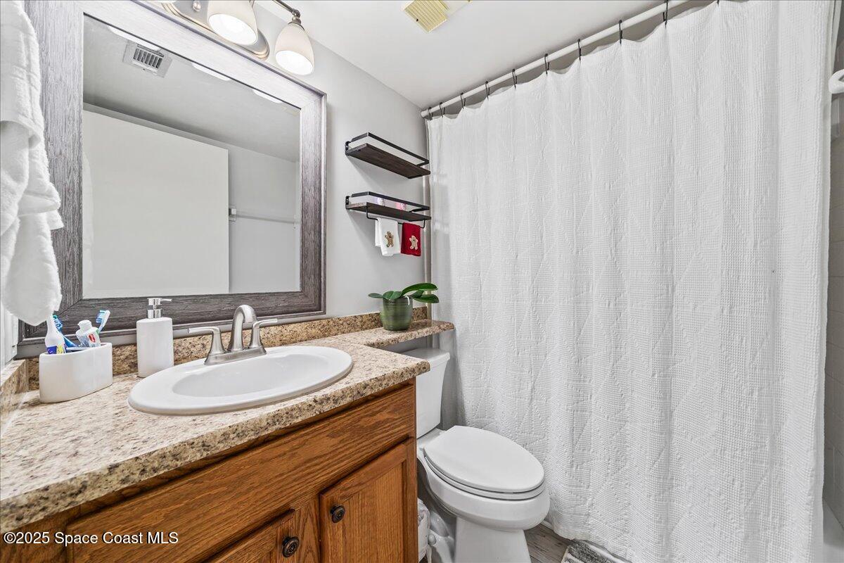2775 North Wickham Road, Unit A403 Melbourne, FL 32935 - Photo 15 of 24 Guest bath