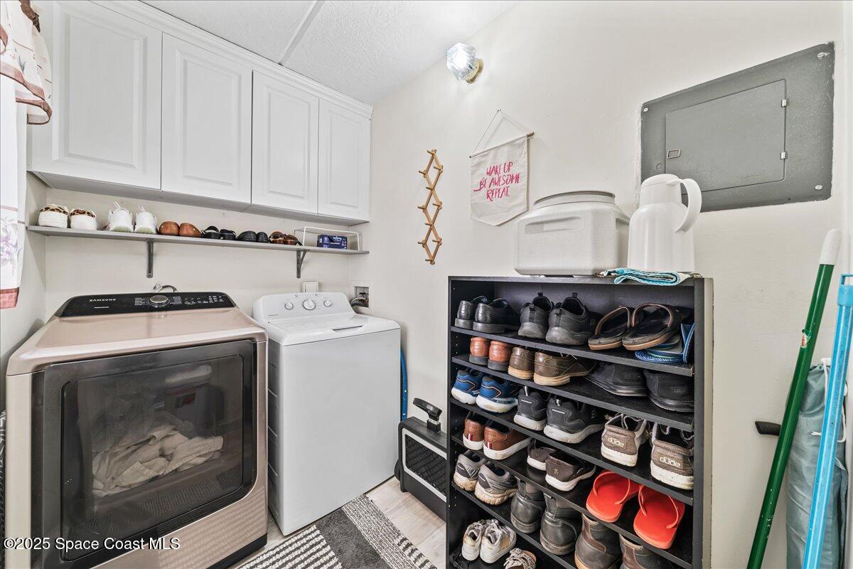 2775 North Wickham Road, Unit A403 Melbourne, FL 32935 - Photo 16 of 24 Indoor laundry area
