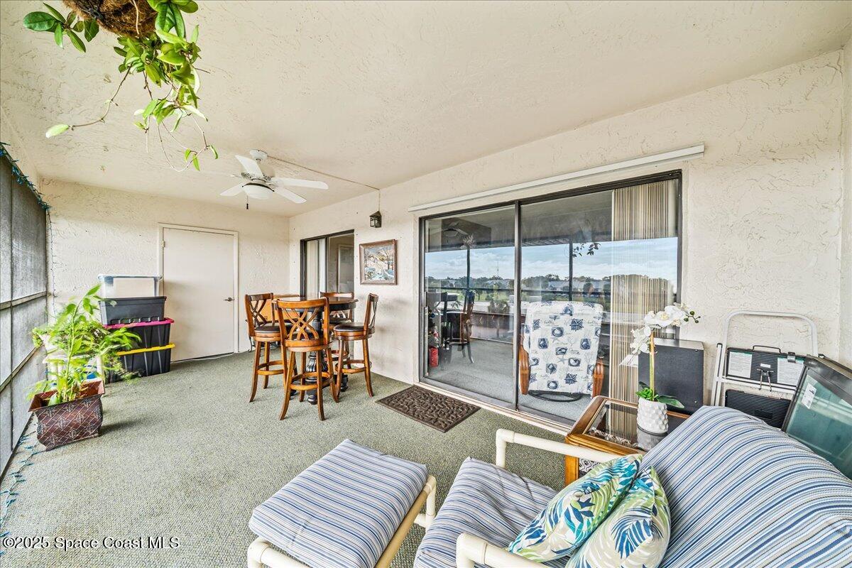 2775 North Wickham Road, Unit A403 Melbourne, FL 32935 - Photo 22 of 24 Screened in Balcony