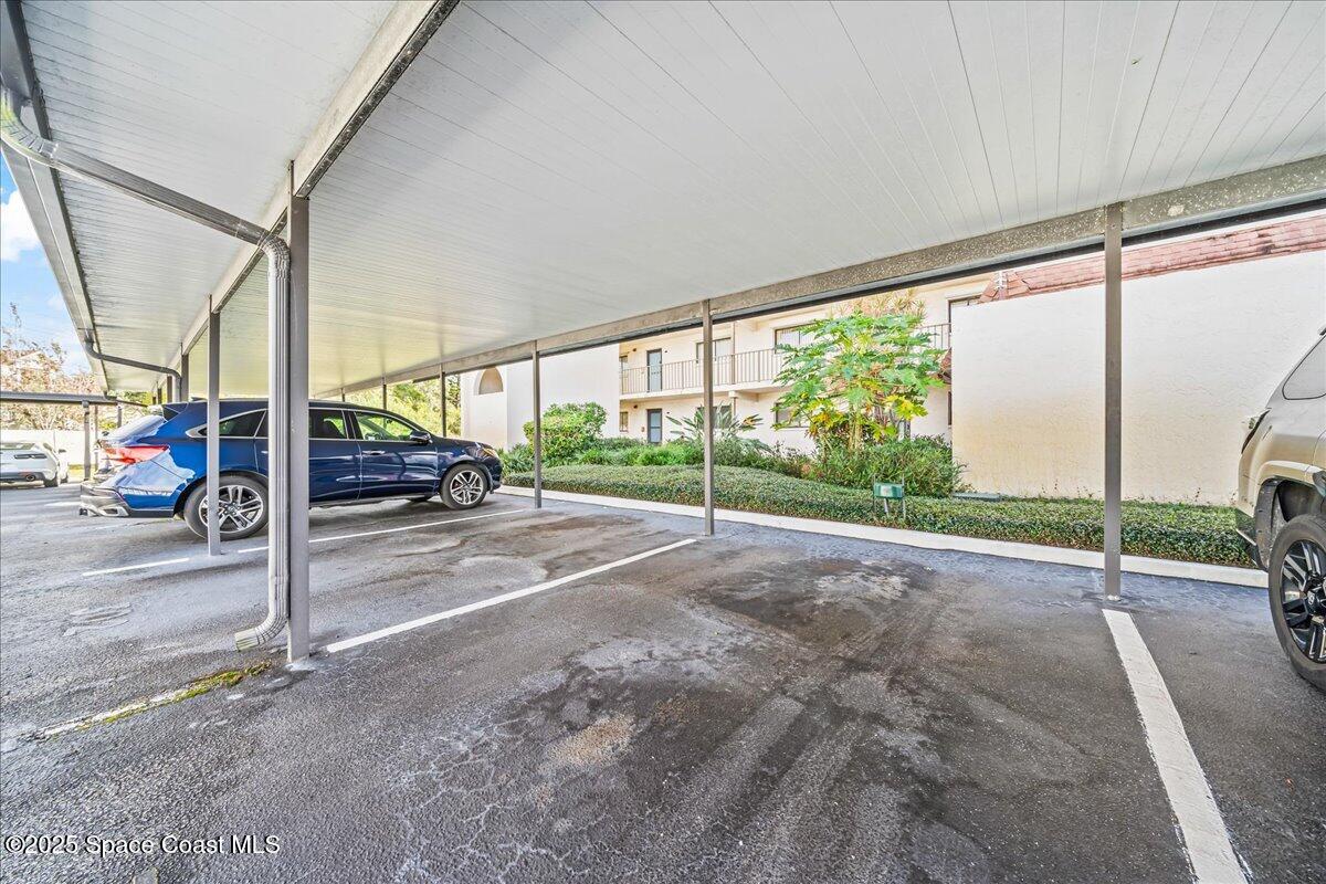 2775 North Wickham Road, Unit A403 Melbourne, FL 32935 - Photo 23 of 24 Covered parking