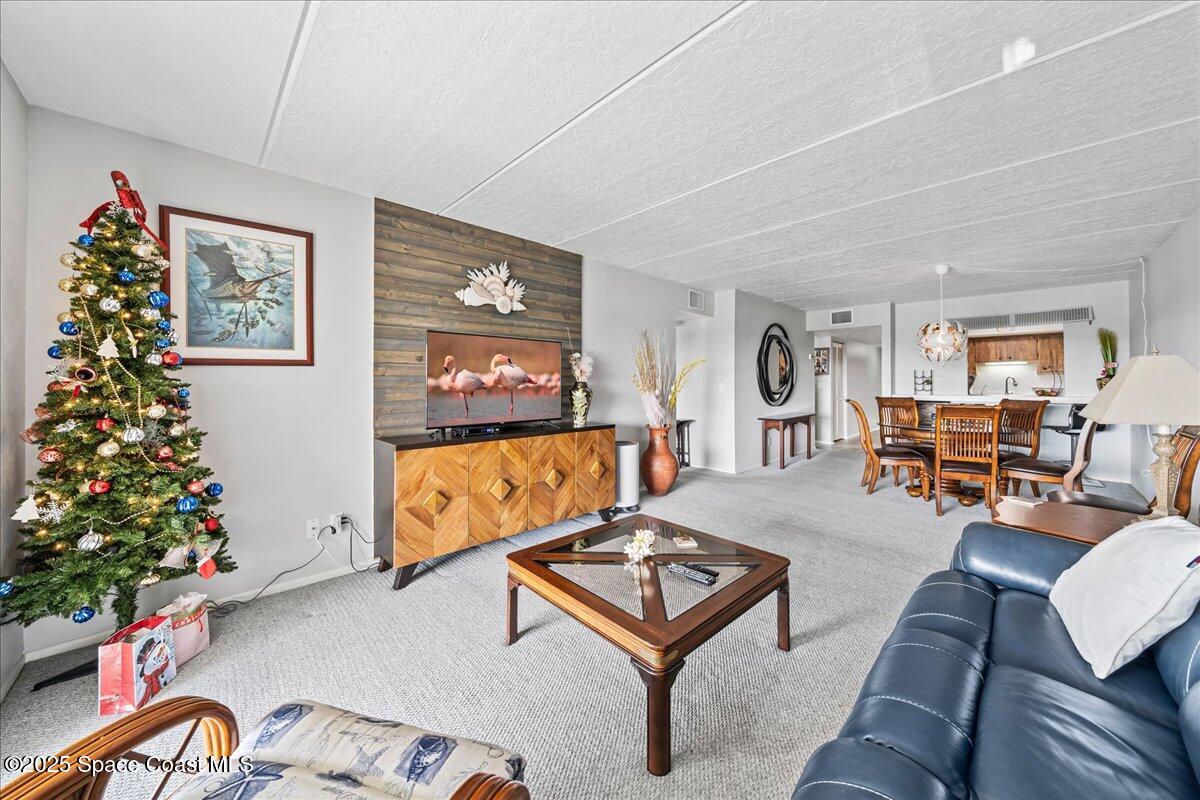 2775 North Wickham Road, Unit A403 Melbourne, FL 32935 - Photo 9 of 24 Family room