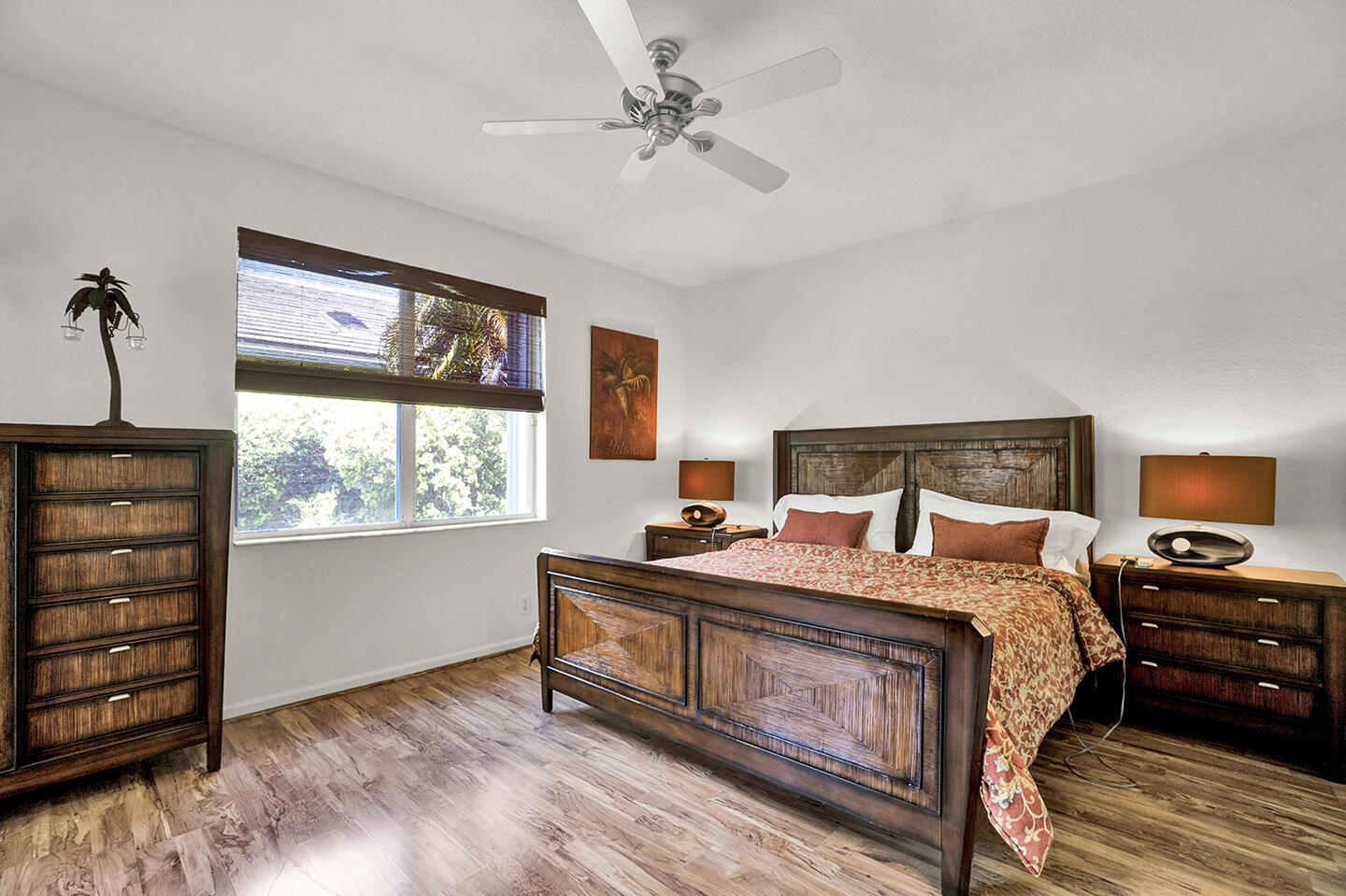 22831 Windsor Wood Court Boca Raton, FL 33433 - Photo 13 of 48 a bedroom with a bed a dresser and a window