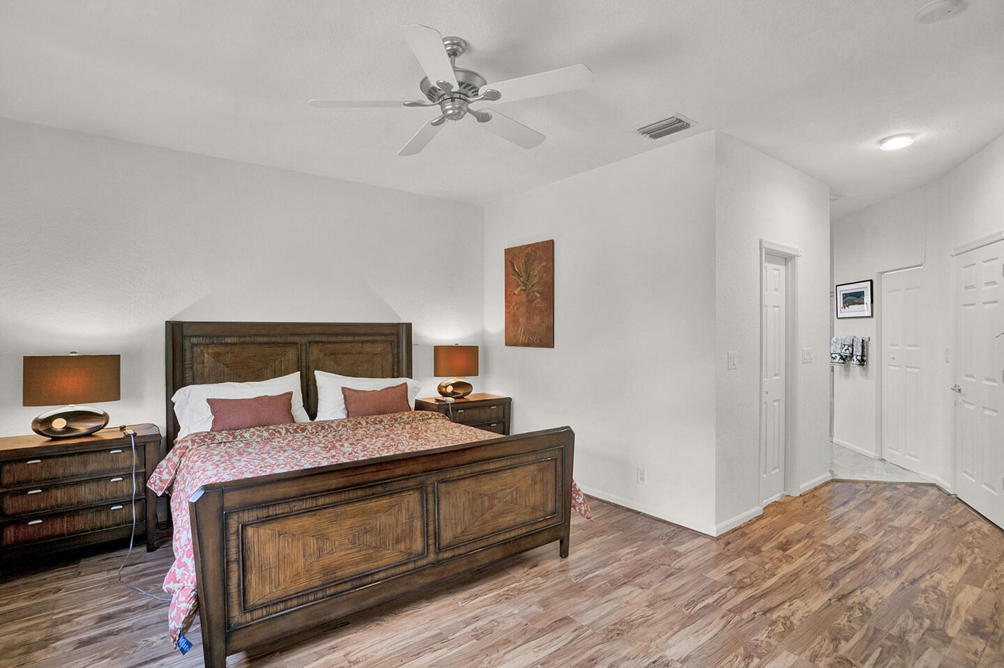 22831 Windsor Wood Court Boca Raton, FL 33433 - Photo 15 of 48 a bedroom with a bed and wooden floor