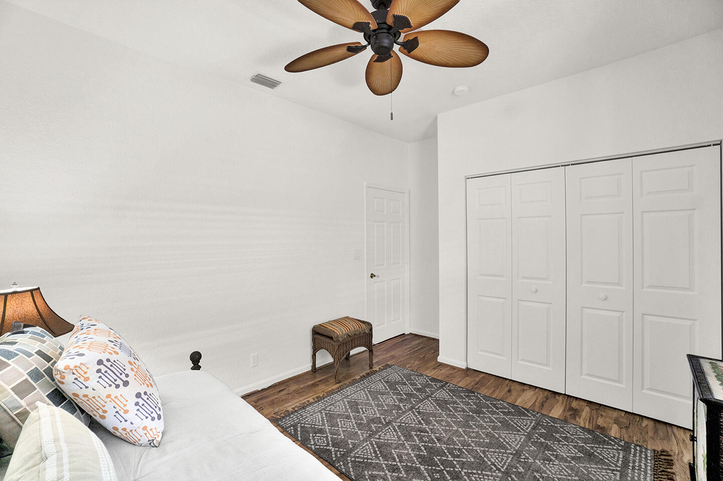 22831 Windsor Wood Court Boca Raton, FL 33433 - Photo 20 of 48 a bedroom with a bed and cabinets