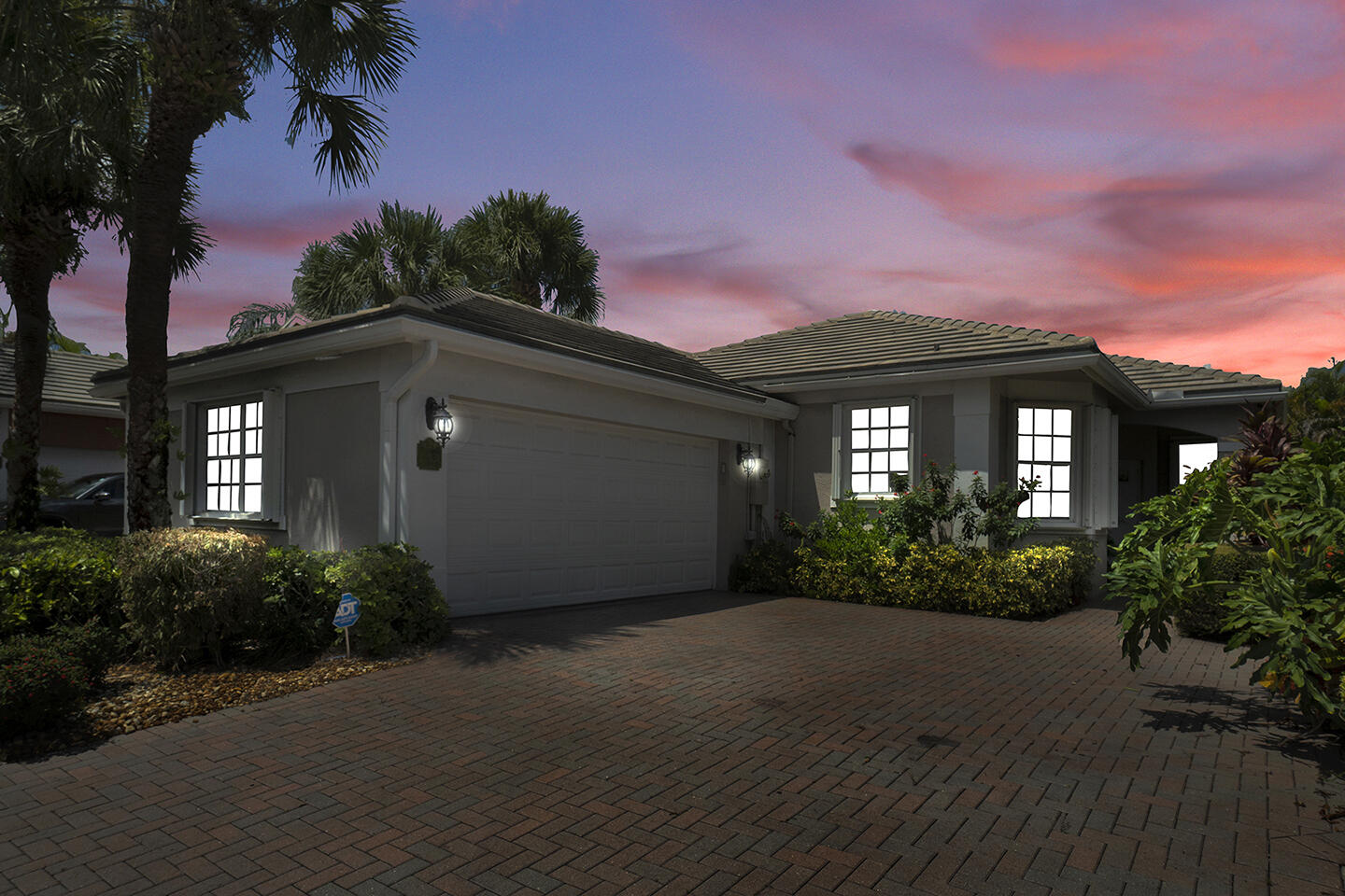 22831 Windsor Wood Court Boca Raton, FL 33433 - Photo 2 of 48 a front view of a house with a yard