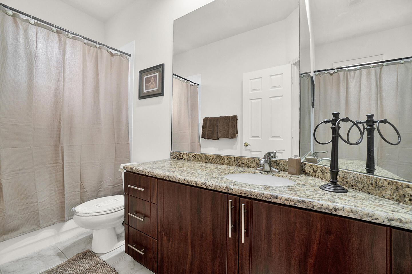 22831 Windsor Wood Court Boca Raton, FL 33433 - Photo 21 of 48 a bathroom with a granite countertop sink toilet and a mirror