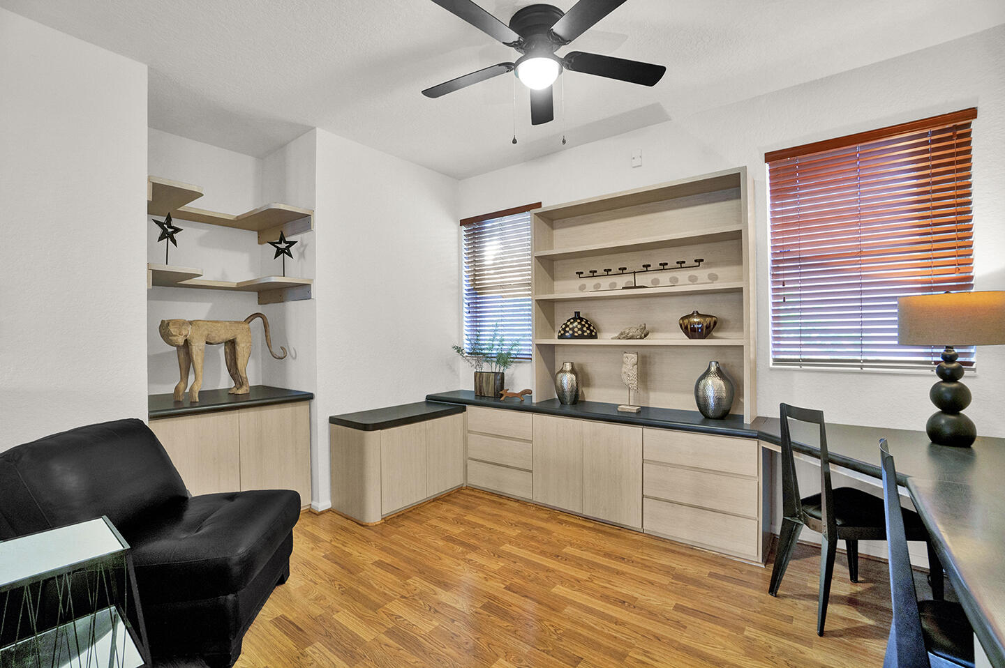 22831 Windsor Wood Court Boca Raton, FL 33433 - Photo 22 of 48 a kitchen with stainless steel appliances a sink a stove a refrigerator dining table and chairs