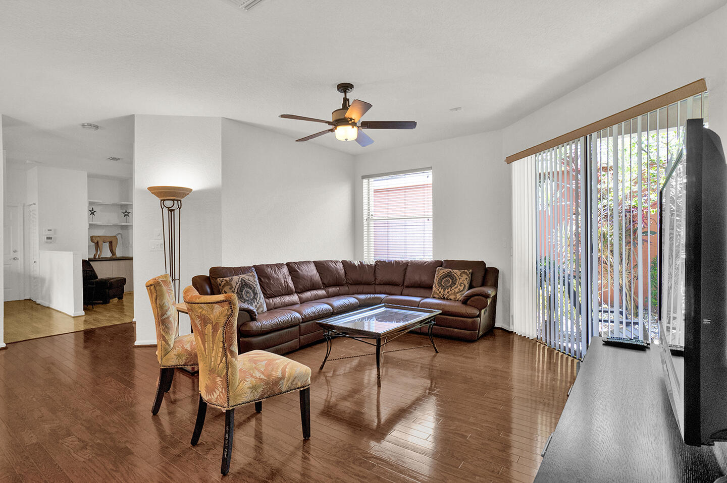 22831 Windsor Wood Court Boca Raton, FL 33433 - Photo 25 of 48 a living room with furniture and a large window