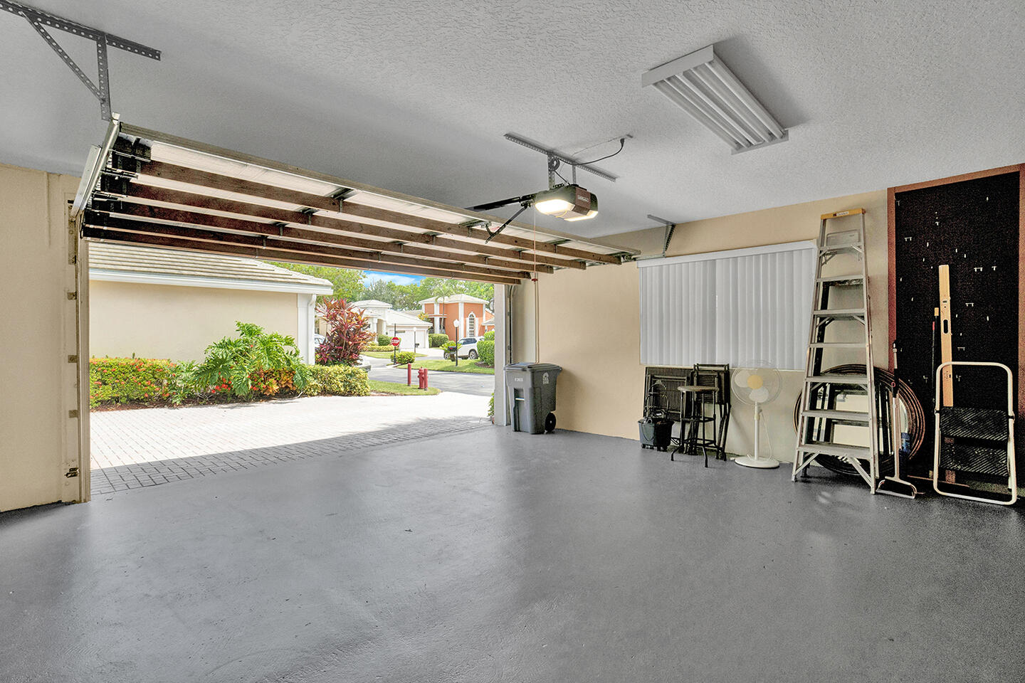 22831 Windsor Wood Court Boca Raton, FL 33433 - Photo 32 of 48 a view of a garage with chairs