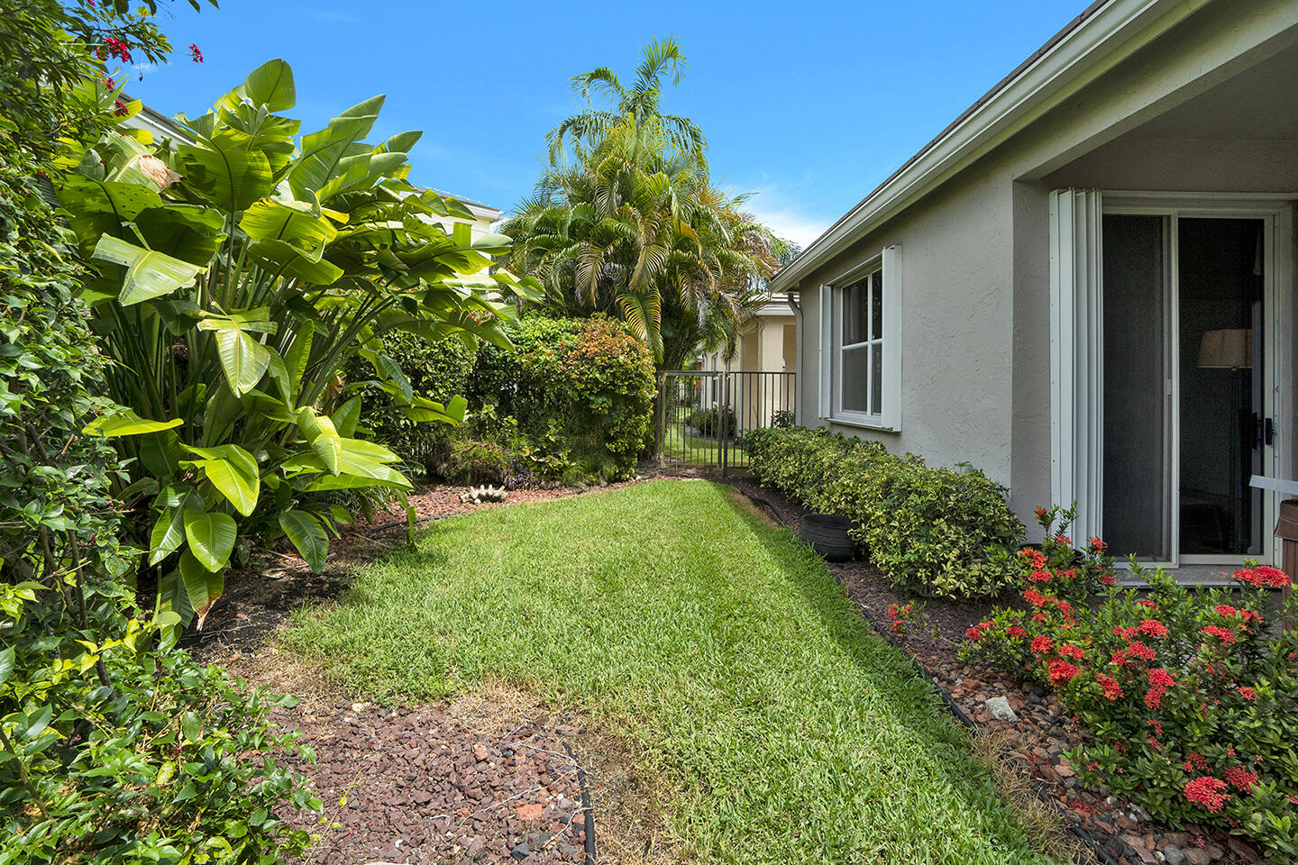 22831 Windsor Wood Court Boca Raton, FL 33433 - Photo 36 of 48 a view of a house with a yard