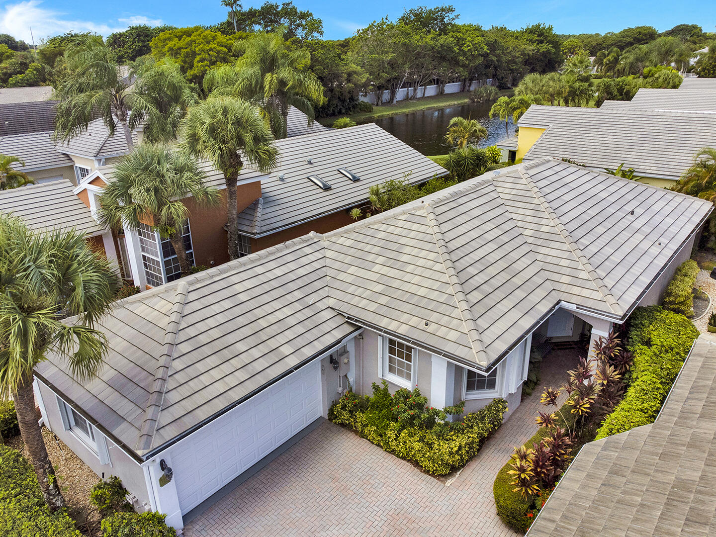 22831 Windsor Wood Court Boca Raton, FL 33433 - Photo 40 of 48 a view of a house with pool and chairs