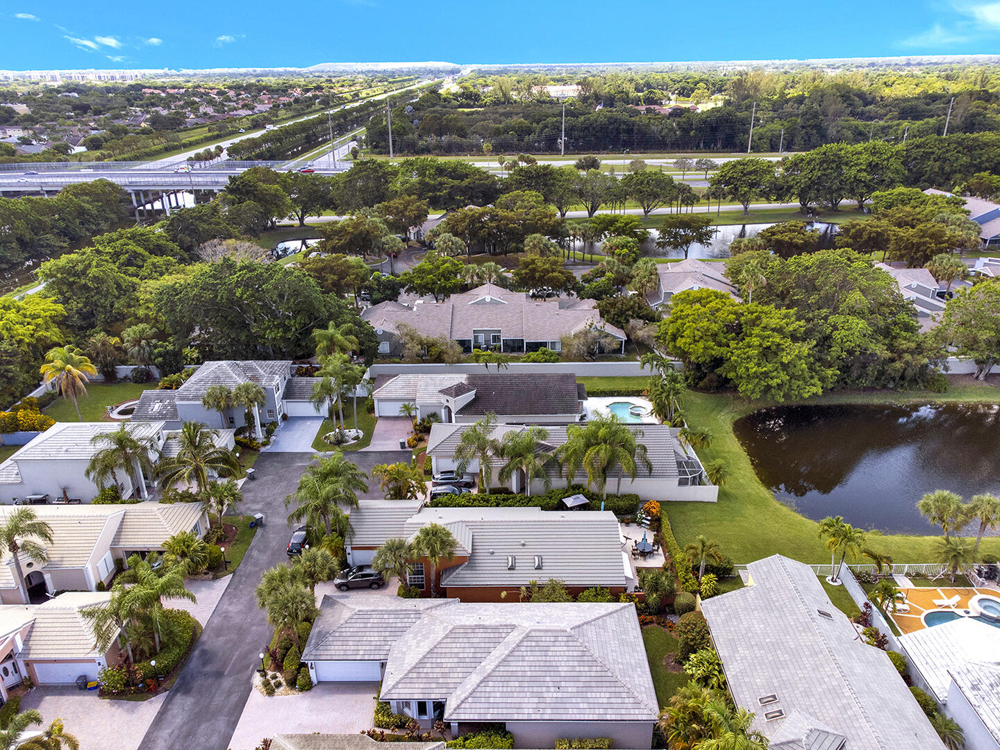 22831 Windsor Wood Court Boca Raton, FL 33433 - Photo 45 of 48 an aerial view of a houses with a lake view